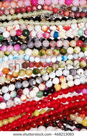 Necklaces in plastic beads
