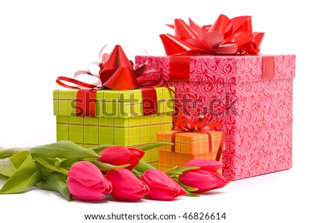 Red tulips and gift boxes on a white background