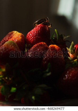 Wedding rings on Strawberries