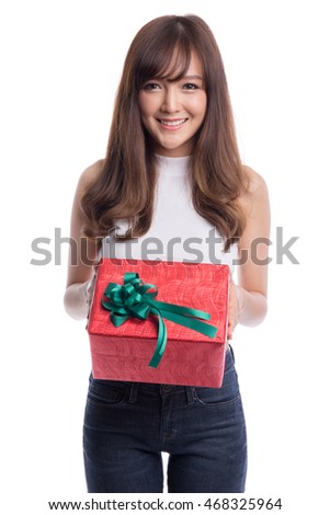Woman with a present or gift box isolated on white background