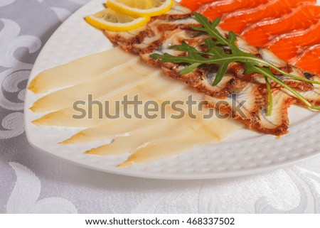 Cutting salmon, eel