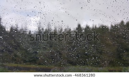 Rain drops on  window car.