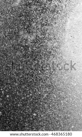 splashes of water black and white photo blurred background