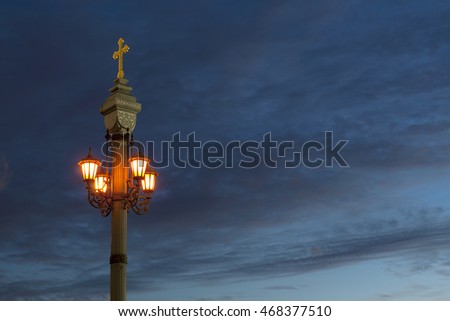 Alone lantern in the night city - picture with place for text