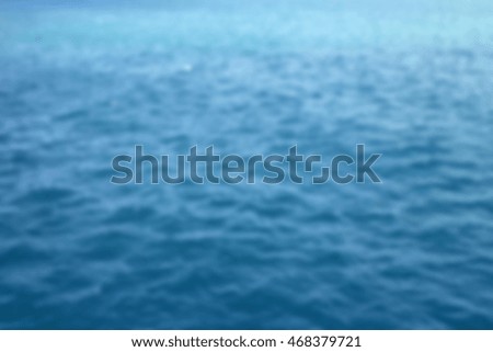 Small blue sea wave, blur ripple on ocean surface, nature water texture background