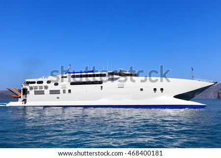 Large White catamaran ferry at sea. Royalty-Free Stock Photo #468400181