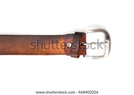 Close up vintage leather belt on white background.