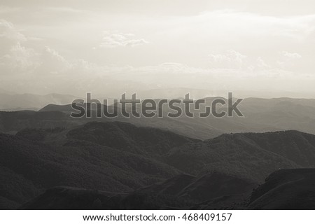 Autumn foggy landscape in Western Caucasus, Russia. Morning mountain landscape. Vintage style