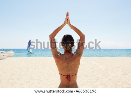 Photo Young Girl Making Yoga Beach. Fitness Woman Spending Active Time Outdoor Sea. Summer Season Caribbean Ocean. Horizontal Picture. Blurred background. Back View
