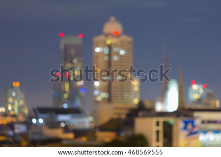 Blurred lights city office building with twilight background