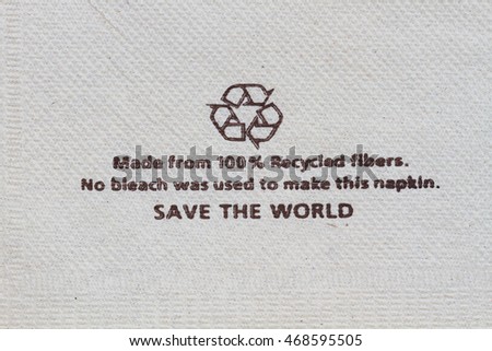 horizontal photo of recycle tissue paper background with words and recycle logo.