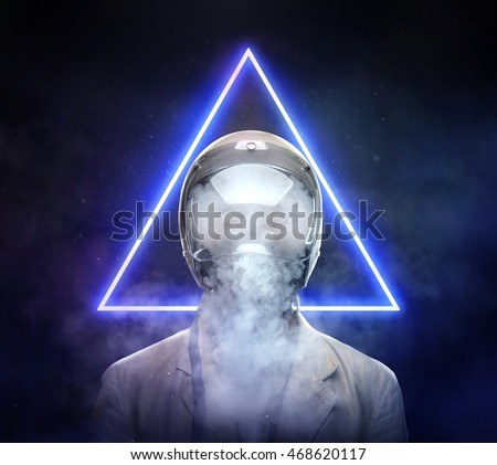Male in astronaut space helmet smoking electronic cigarette over blue neon hipster triangle background.