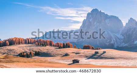 Fine autumn landscape with mountains and colorful trees