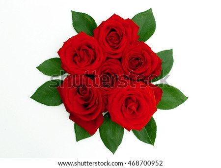 bouquet of red roses with green leaves. view from the top Royalty-Free Stock Photo #468700952