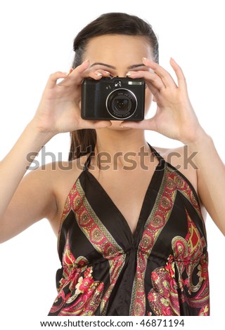 Young woman with digital camera