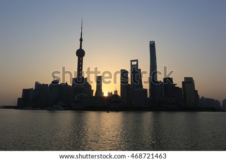 Shanghai financial district at dawn.