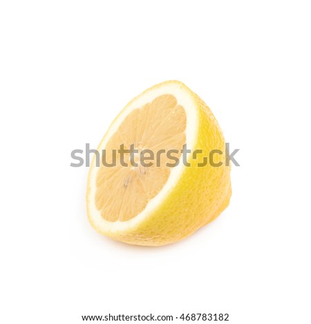 Half of a fresh yellow lemon fruit isolated over the white background