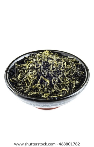 Chinese green tea in tea cup on white background
