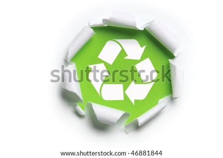 ripped white paper with recycle logo against a green background Royalty-Free Stock Photo #46881844
