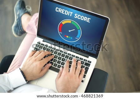 People using laptop and CREDIT SCORE concept on screen Royalty-Free Stock Photo #468821369
