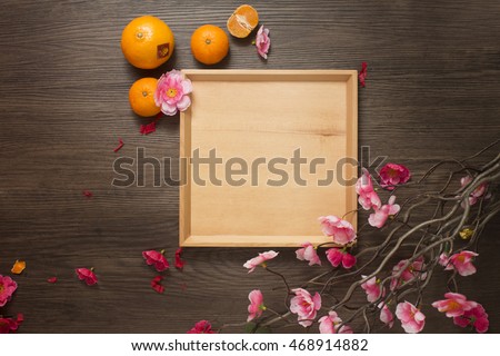 Flat lay Chinese new year text space table top shot. Royalty-Free Stock Photo #468914882