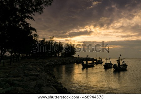 the fishing boat parking in the sea at morning