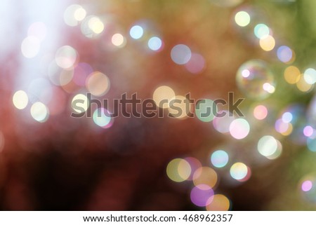 Colorful abstract blurred background with bokeh lights 