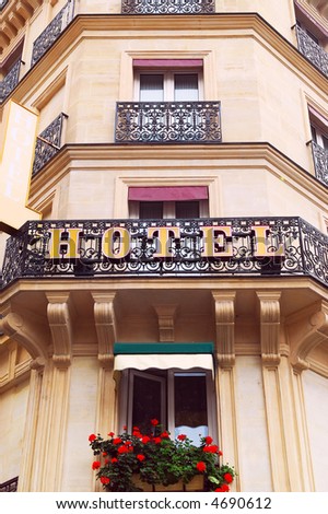 Hotel building with wrought iron balconies in Paris, France