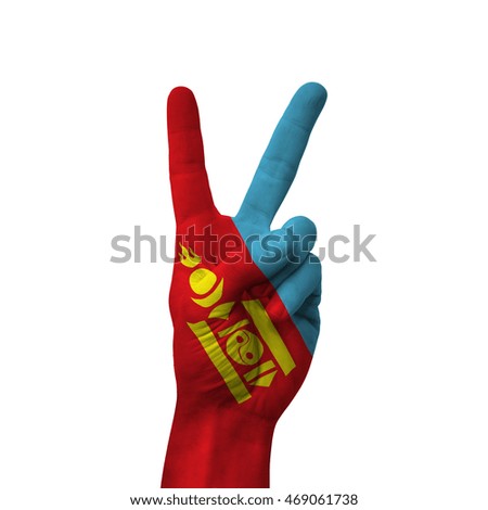 Hand making victory sign, mongolia painted with flag as symbol of victory, win, success - isolated on white background