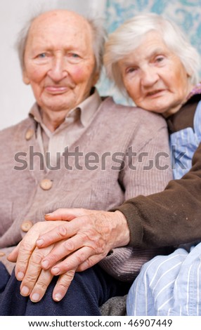 Old happy grandparents staying together