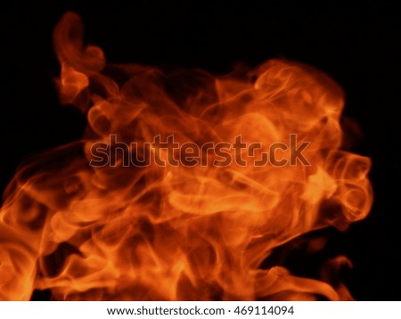The texture of a flame of fire on a black background