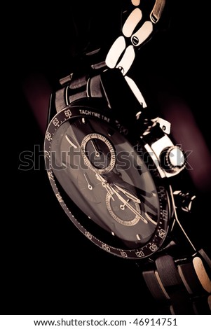 close-up of a wristwatch on a black Royalty-Free Stock Photo #46914751