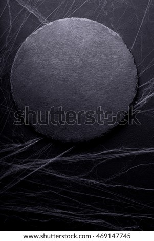 Background for Halloween. Black Moon and spider web.