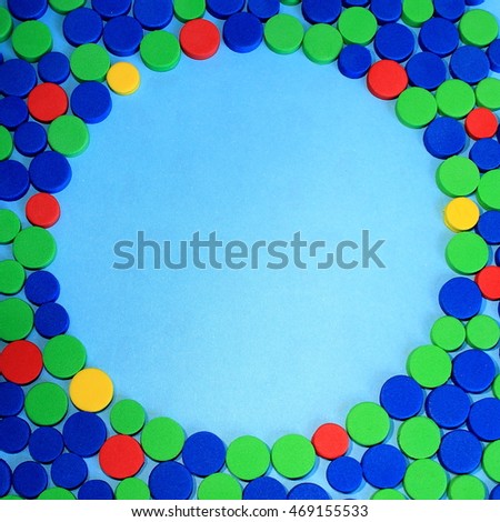 Background with many colorful circular pieces of confetti with space for text