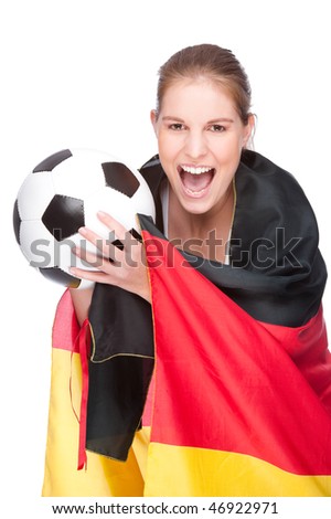 Full isolated studio picture from a young and beautiful woman with football and Germany flag