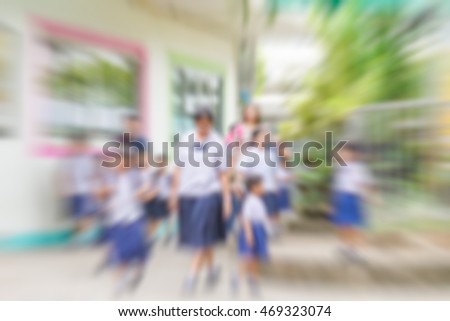 Abstract blur and zoom effect of Asian students in school. Education Concept.