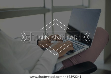 People Using Laptop and LEARN AND LEAD Concept