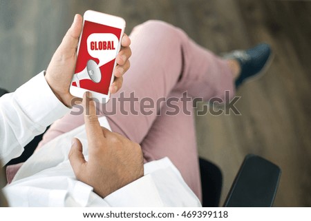 People using smart phone and GLOBAL announcement concept on screen