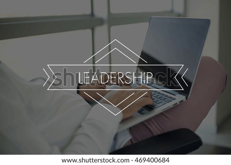 People Using Laptop and LEADERSHIP Concept
