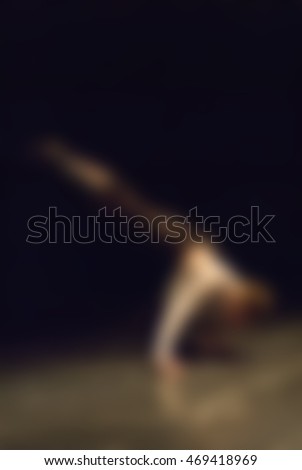 Contemporary dance performance abstract blur background with shallow depth of field