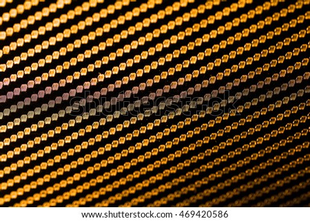 Kevlar abstract golden background.