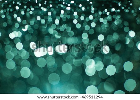 abstract of  blue light  and glitter bokeh. image is blurred