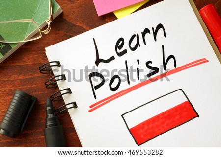 Learn polish written in a notepad.  Education concept. Royalty-Free Stock Photo #469553282