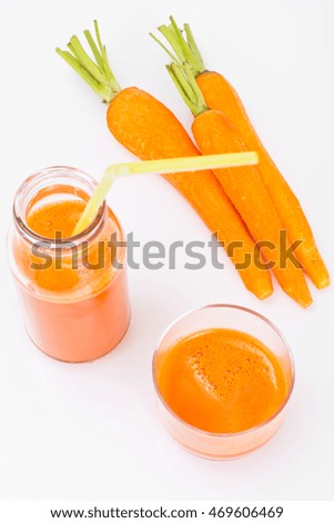 Fresh Juicy Orange Carrots and Juice Studio Photo