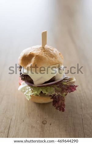 Burger on wooden table