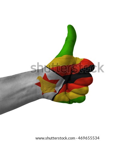 Hand making thumbs up sign, zimbabwe painted with flag as symbol of thumbs up, like, okay, positive  - isolated on white background