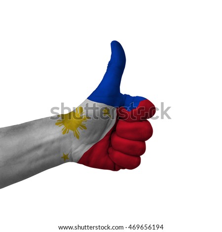 Hand making thumbs up sign, philippines painted with flag as symbol of thumbs up, like, okay, positive  - isolated on white background