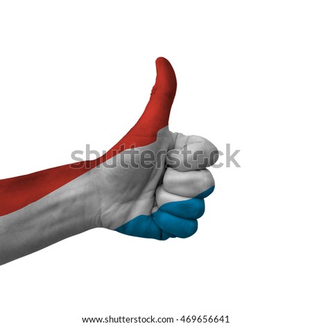 Hand making thumbs up sign, luxembourg painted with flag as symbol of thumbs up, like, okay, positive  - isolated on white background