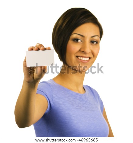 An ethnic woman holds a blank, horizontal, business card at arm's length. Focus is on the card, with face out of focus.