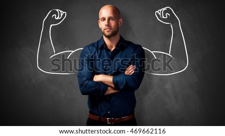 handsome man with power gesture Royalty-Free Stock Photo #469662116